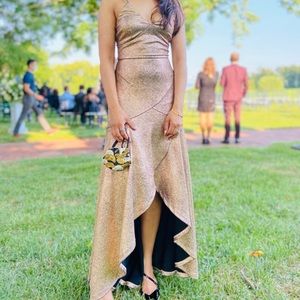 Metallic Gold dress mermaid hi-low style. size 4 stretchy material.